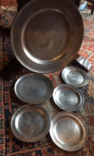 18th century English pewter charger and (4) plates including (1) continental bonus plate.