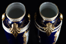 Two Albert Gregory signed Royal Crown Derby vases from the 1890-1921 production years. Measure 9.5"h x 6"w. From a San Francisco collection.