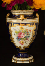 Two Albert Gregory signed Royal Crown Derby vases from the 1890-1921 production years. Measure 9.5"h x 6"w. From a San Francisco collection.