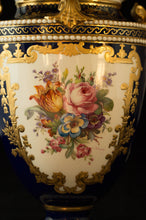 Two Albert Gregory signed Royal Crown Derby vases from the 1890-1921 production years. Measure 9.5"h x 6"w. From a San Francisco collection.