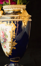 Two Albert Gregory signed Royal Crown Derby vases from the 1890-1921 production years. Measure 9.5"h x 6"w. From a San Francisco collection.