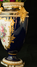 Two Albert Gregory signed Royal Crown Derby vases from the 1890-1921 production years. Measure 9.5"h x 6"w. From a San Francisco collection.
