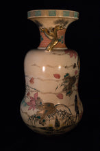 A fine Japanese Meiji period satsuma vase with scenic figural decorations of Spring triumphant over Winter. Features jobitaki (Daurian redstart), Sazanka (camelia) thistles and pine