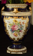 Two Albert Gregory signed Royal Crown Derby vases from the 1890-1921 production years. Measure 9.5"h x 6"w. From a San Francisco collection.