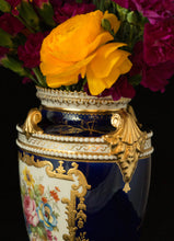 Two Albert Gregory signed Royal Crown Derby vases from the 1890-1921 production years. Measure 9.5"h x 6"w. From a San Francisco collection.