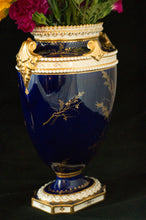 Two Albert Gregory signed Royal Crown Derby vases from the 1890-1921 production years. Measure 9.5"h x 6"w. From a San Francisco collection.