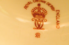 Two Albert Gregory signed Royal Crown Derby vases from the 1890-1921 production years. Measure 9.5"h x 6"w. From a San Francisco collection.