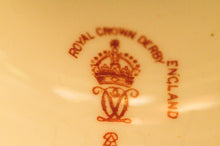 Two Albert Gregory signed Royal Crown Derby vases from the 1890-1921 production years. Measure 9.5"h x 6"w. From a San Francisco collection.