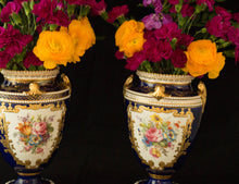 Two Albert Gregory signed Royal Crown Derby vases from the 1890-1921 production years. Measure 9.5"h x 6"w. From a San Francisco collection.