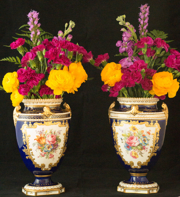 Two Albert Gregory signed Royal Crown Derby vases from the 1890-1921 production years. Measure 9.5