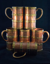 Circa 1890 set of six copper mugs with four bands of brass and ear-form handle stack profile Greenans Cottage decorative arts and antiques Virginia USA