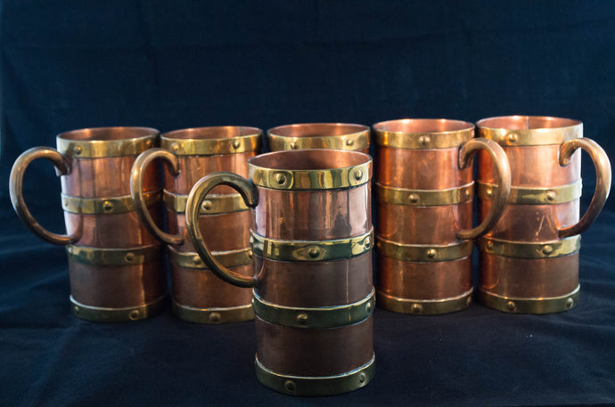 Circa 1890 set of six copper mugs with four bands of brass and ear-form handle face presentation Greenans Cottage decorative arts and antiques Virginia USA